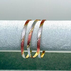 Gold plated bangles / bracelets, set of 3
8.5” 
New, Never worn